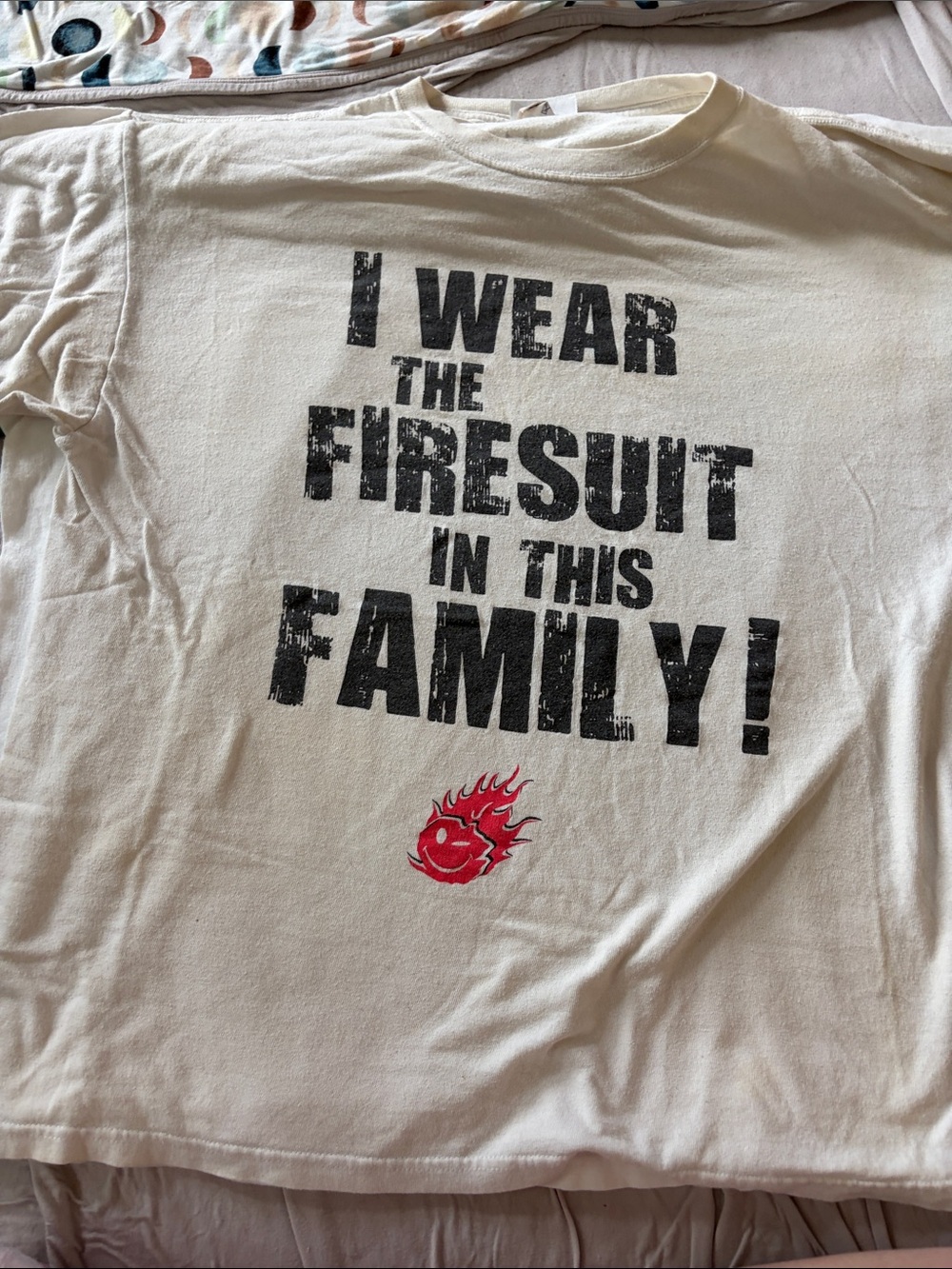B64 Vintage NASCAR Graphic Tee "I Wear The Firesuit In This Family" Yellowing
